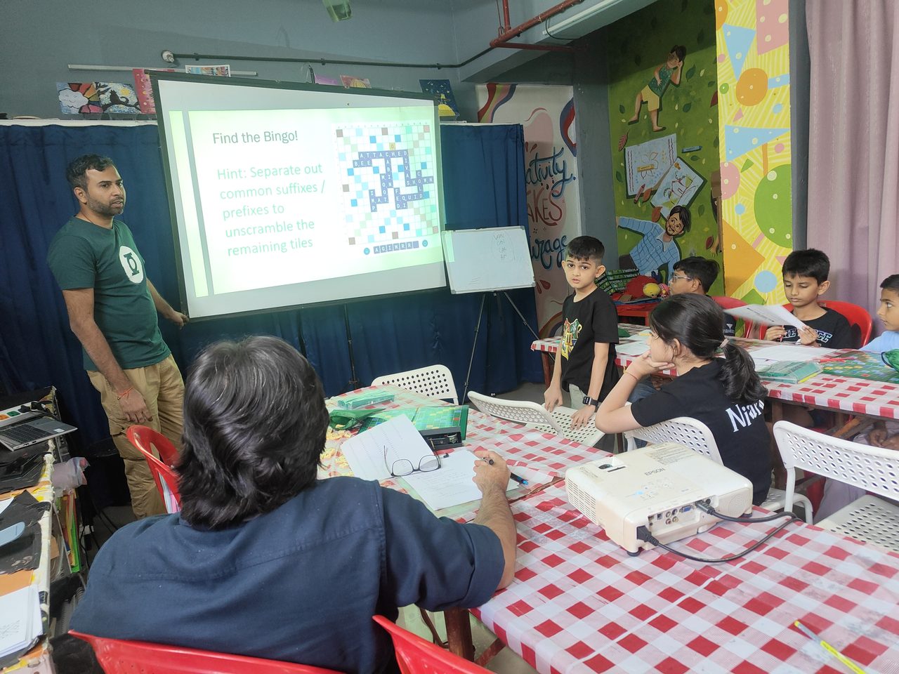 Find the Bingo — students working through the hint