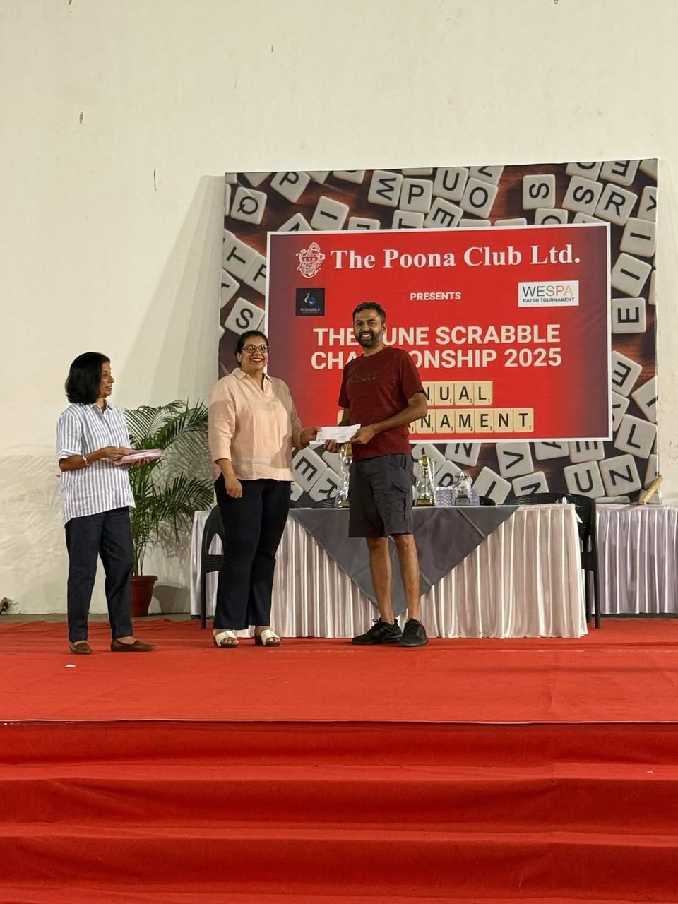 Sid receiving his award at the Poona Scrabble Championship 2025