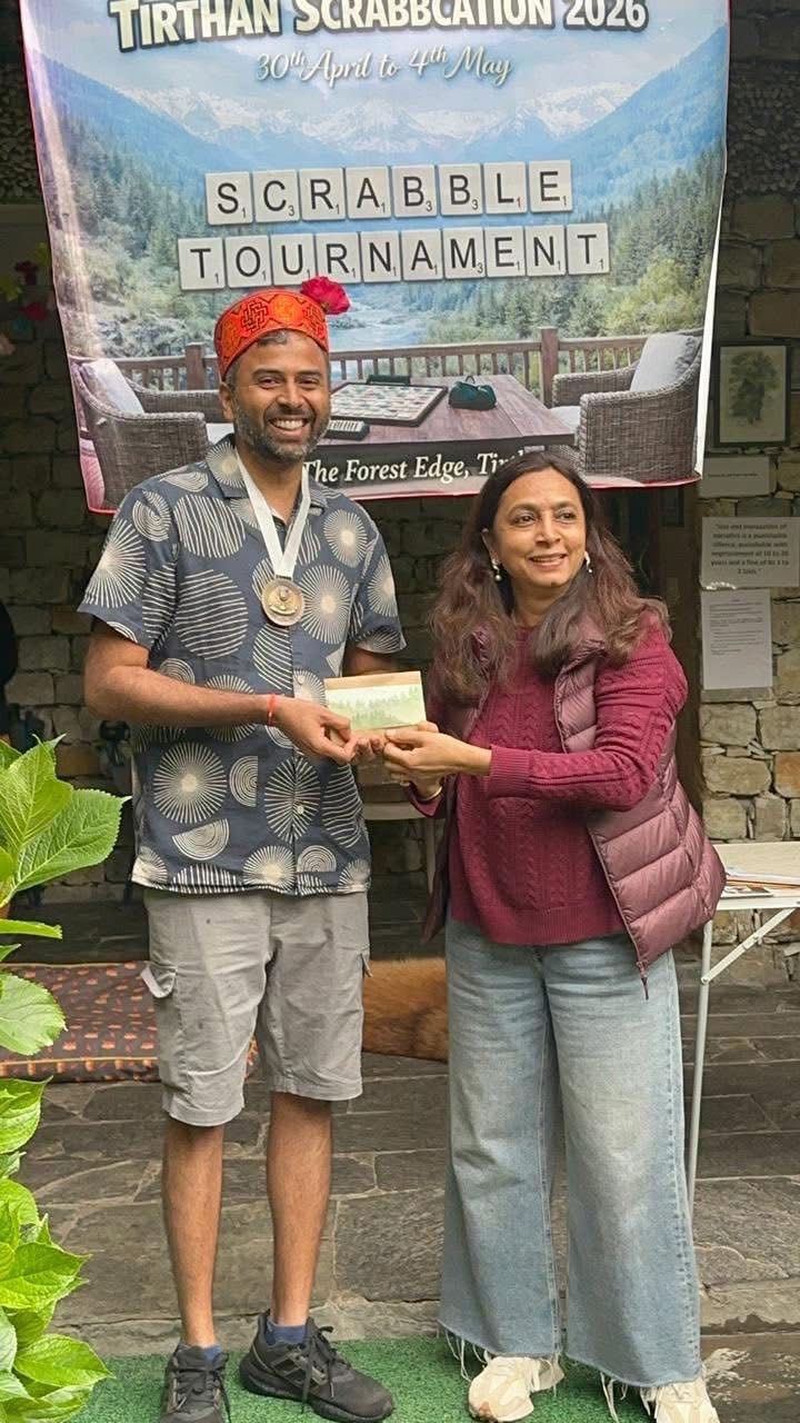 Sid receiving his award at the Tirthan Scrabbcation 2026